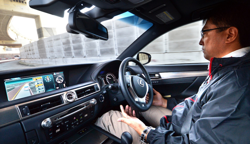 Japan's auto giant Toyota demonstrates autonomous driving with a Lexus GS450h on the Tokyo metropolitan highway during Toyota's advanced technology presentation in Tokyo on October 6, 2015. Toyota is expecting to commercialise autonomous vehicles before the Tokyo Olympics in 2020. AFP PHOTO / Yoshikazu TSUNO (Photo credit should read YOSHIKAZU TSUNO/AFP/Getty Images)